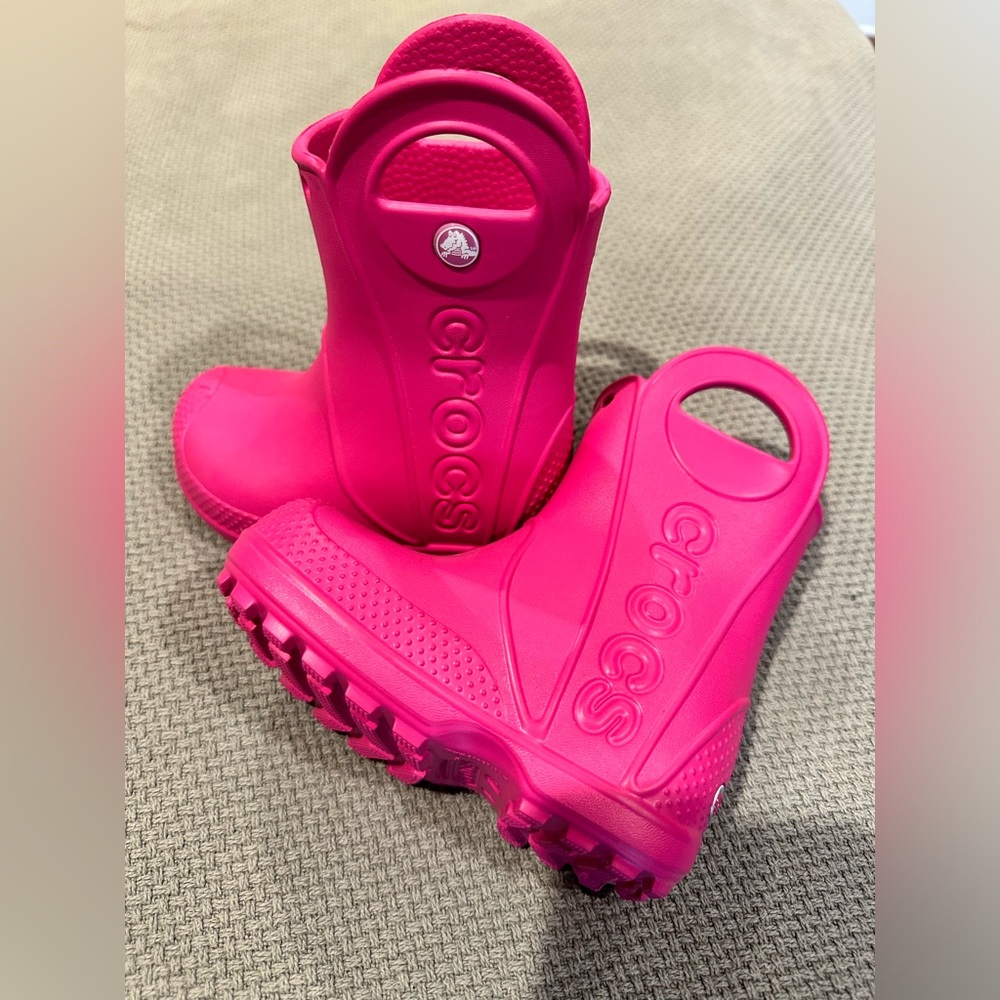 Never worn. Size 6 toddlers. Croc rain boots.